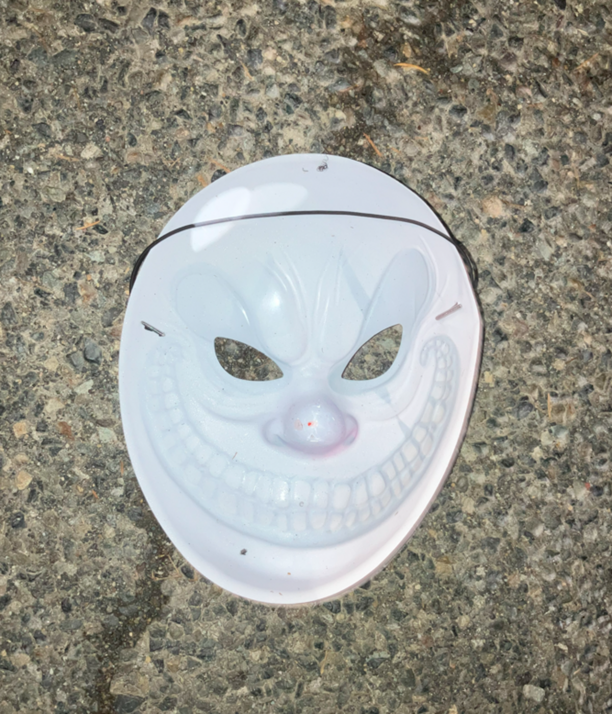 Pierce County sheriffs deputies found a clown mask near the street where the attempted robbery and shooting happened Thursday night.