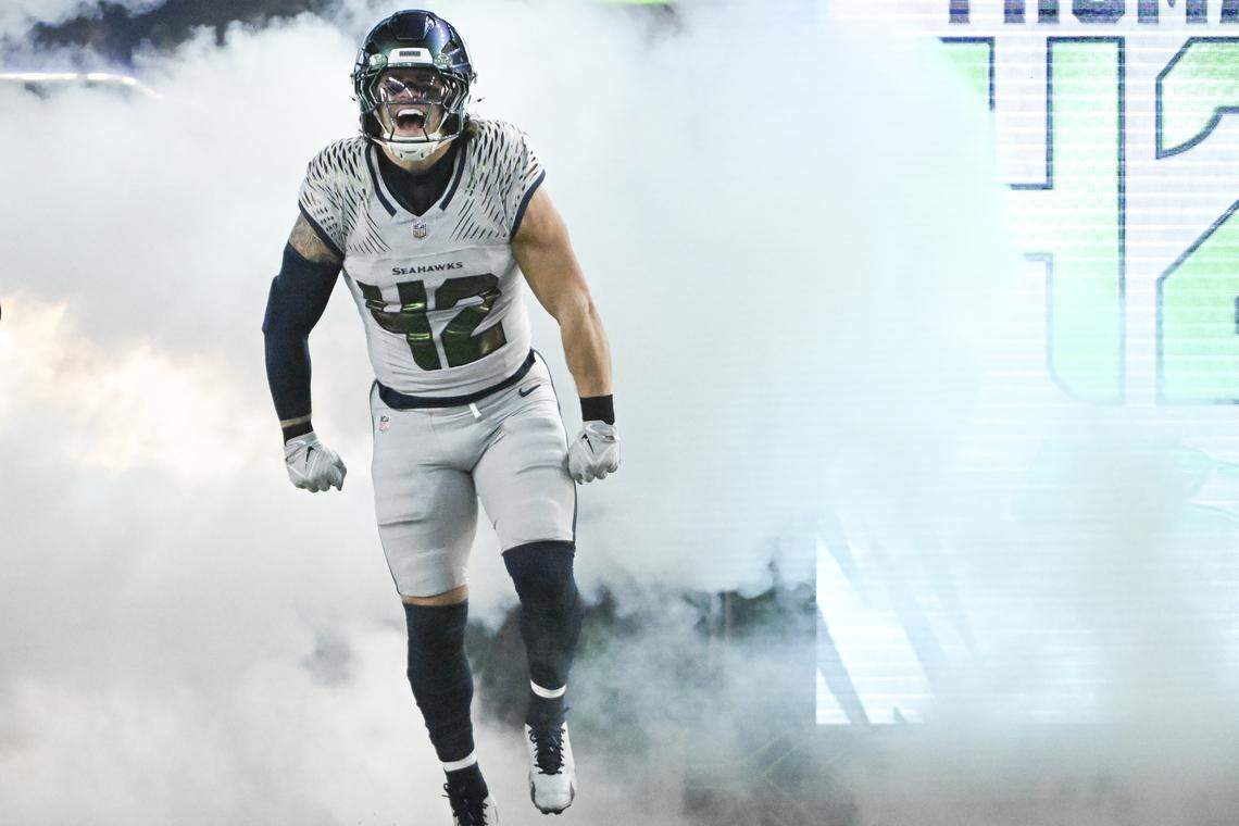 Seattle Seahawks linebacker Drake Thomas (42) enters the field before playing the Los Angeles Rams at Lumen Field, on Thursday, Dec. 18, 2025, in Seattle.