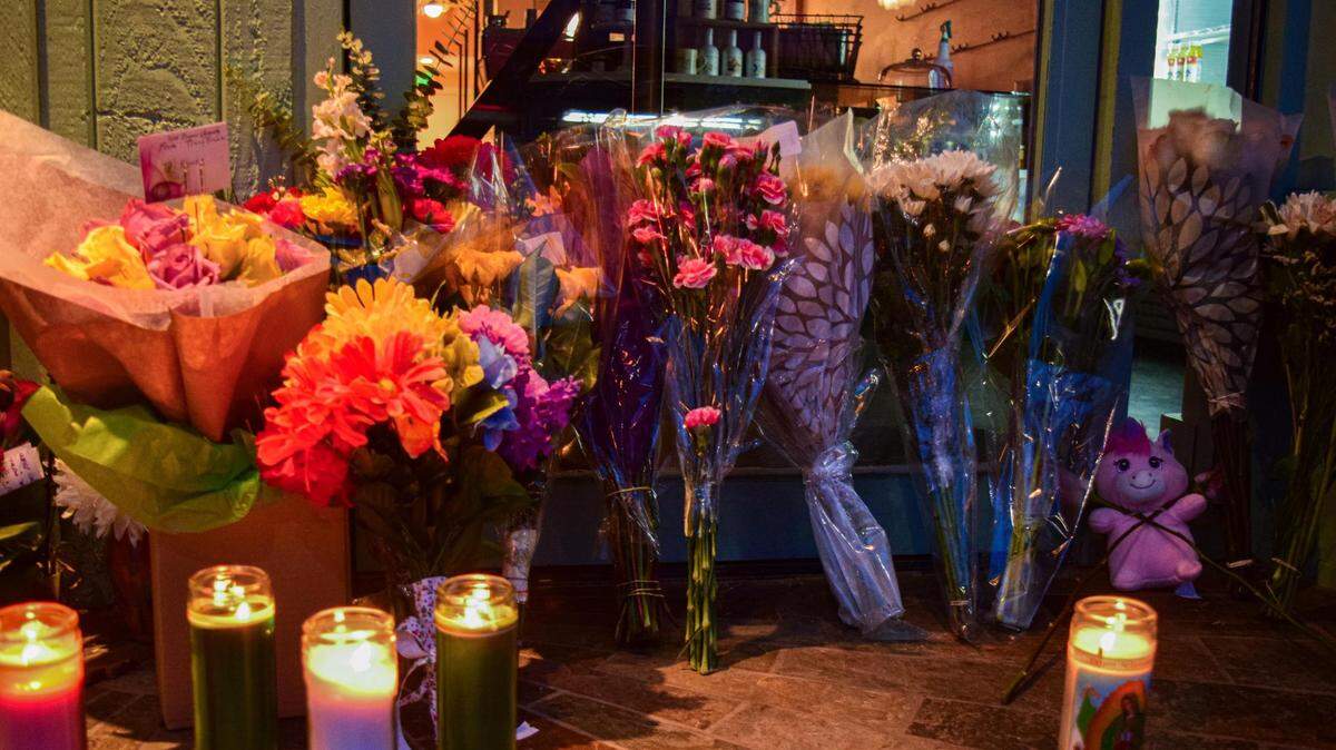 A memorial in honor of Howdy Bagel co-founder Jake Carter grew at the restaurant entrance, 5421 South Tacoma Way in Tacoma on Sunday, Jan. 7, 2024. Carter was fatally shot in New Orleans on Jan. 5.