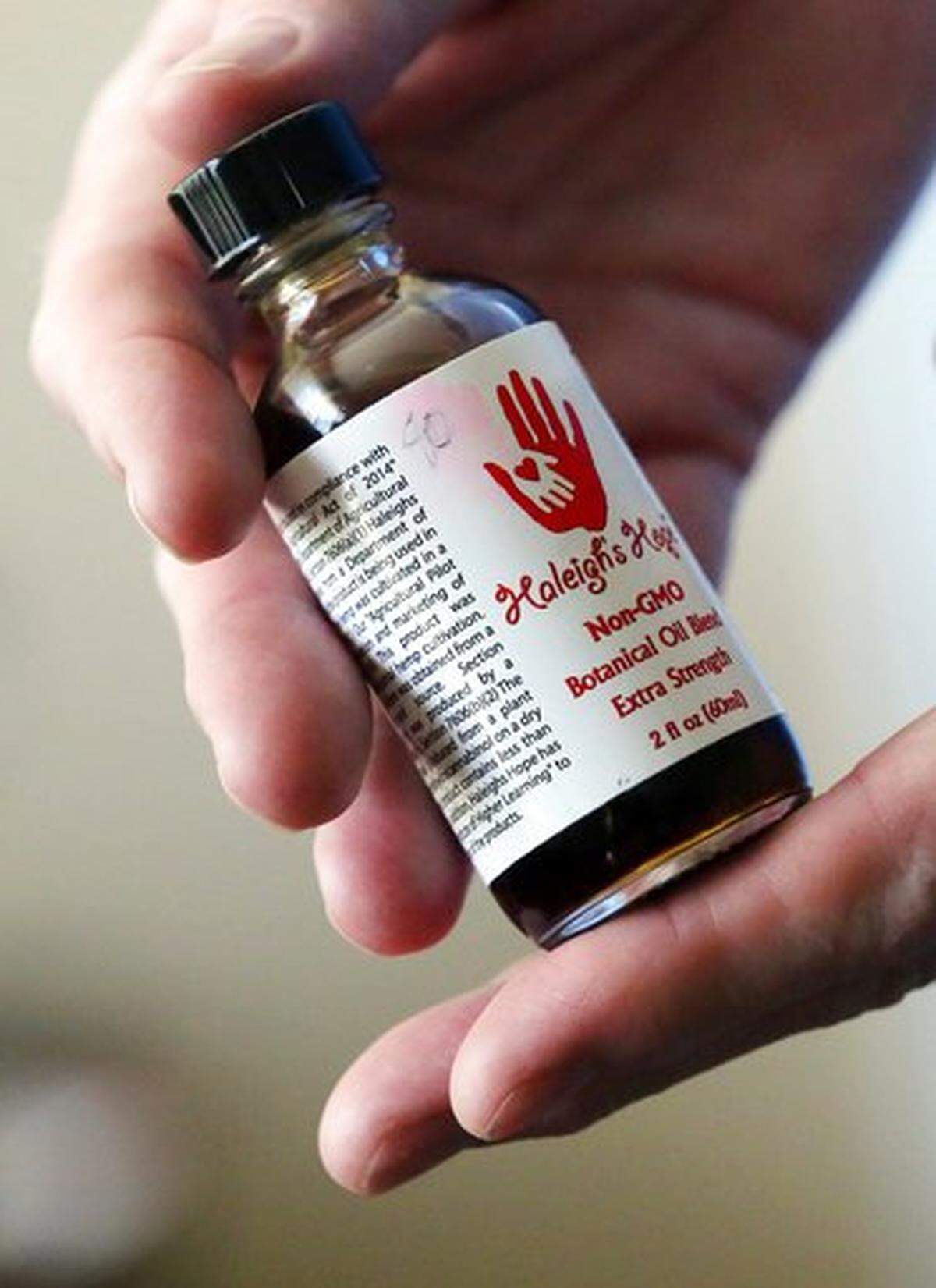 In this June 6, 2017, file photo, the CBD oil Haleigh’s Hope, a cannabis compound, is shown.