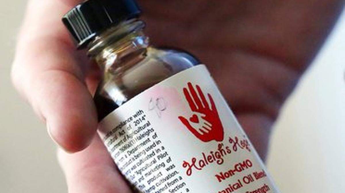 Cannabis compounds are gaining acceptance for relieving pain and treating medical conditions for people of all ages.Here, Doug Rice administers the CBD oil Haleigh’s Hope to his daughter Ashley at their home in West Jordan, Utah.