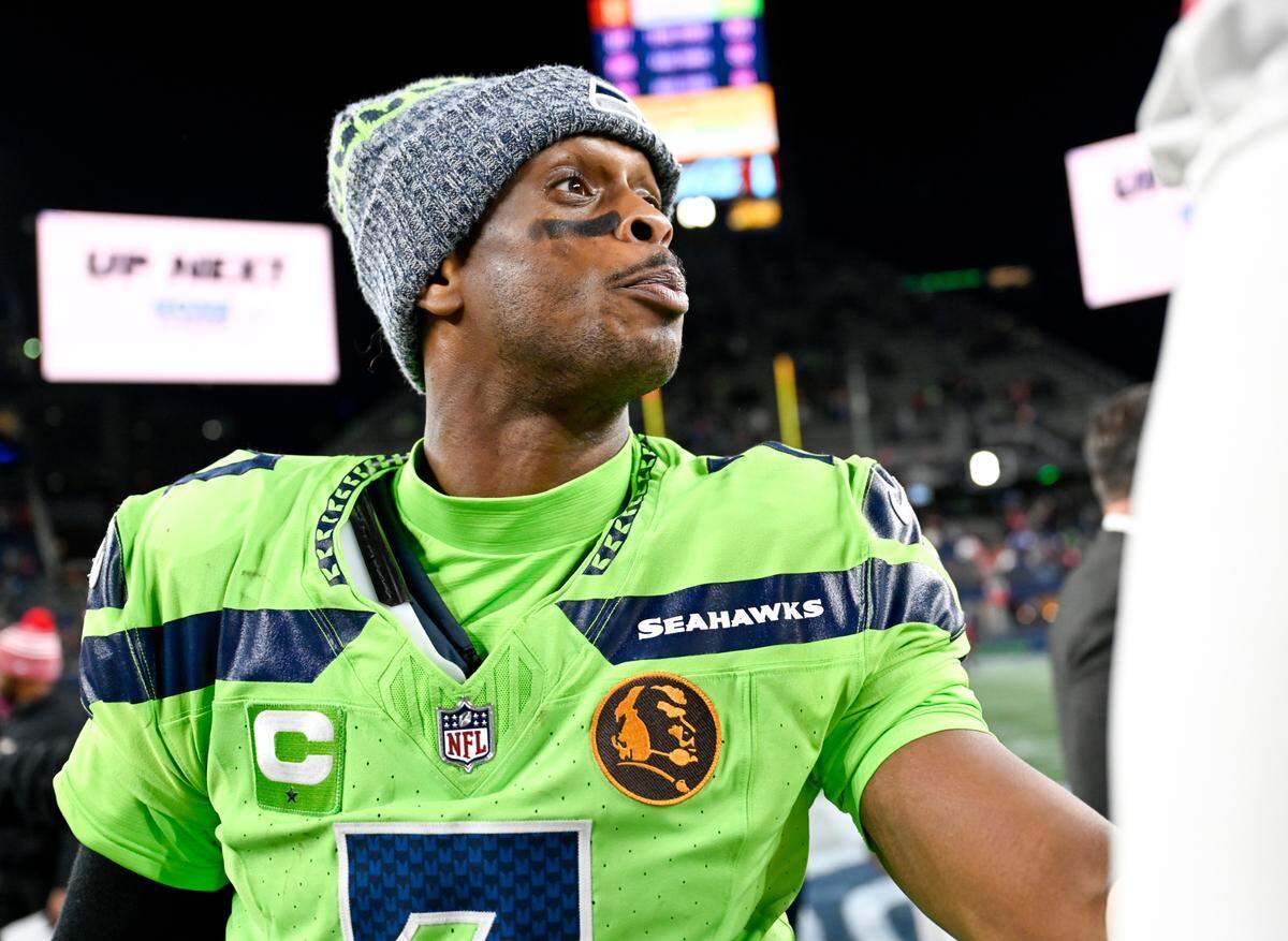 Seattle Seahawks quarterback Geno Smith (7) talks with San Francisco 49ers players after the 49ers 31-13 victory at Lumen Field, Thursday, Nov. 23, 2023, in Seattle, Wash.