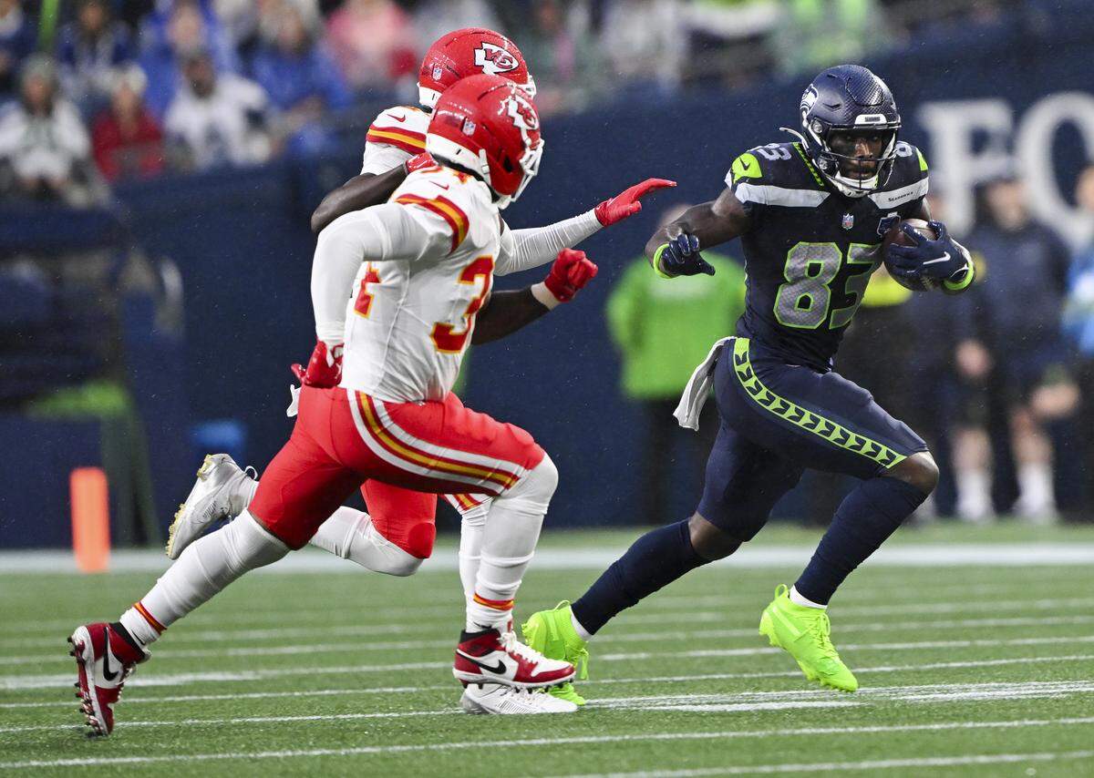 Seattle Seahawks wide receiver Dareke Young (83) picks up yards after the catch during the second quarter of the preseason game at Lumen Field, on Friday, Aug. 15, 2025, in Seattle.