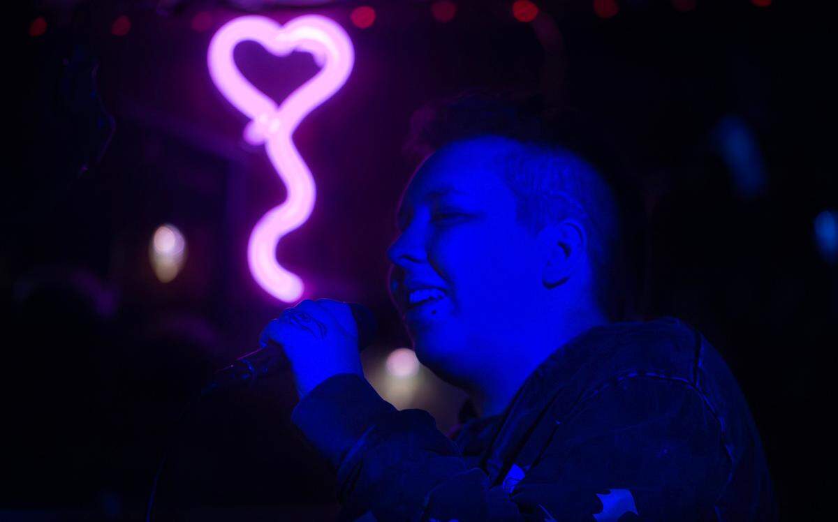 Karaoke perfomer Snake sings during the nightly karaoke at the historic Bob’s Java Jive tavern in Tacoma, Washington, shown on Monday, July 1, 2024.