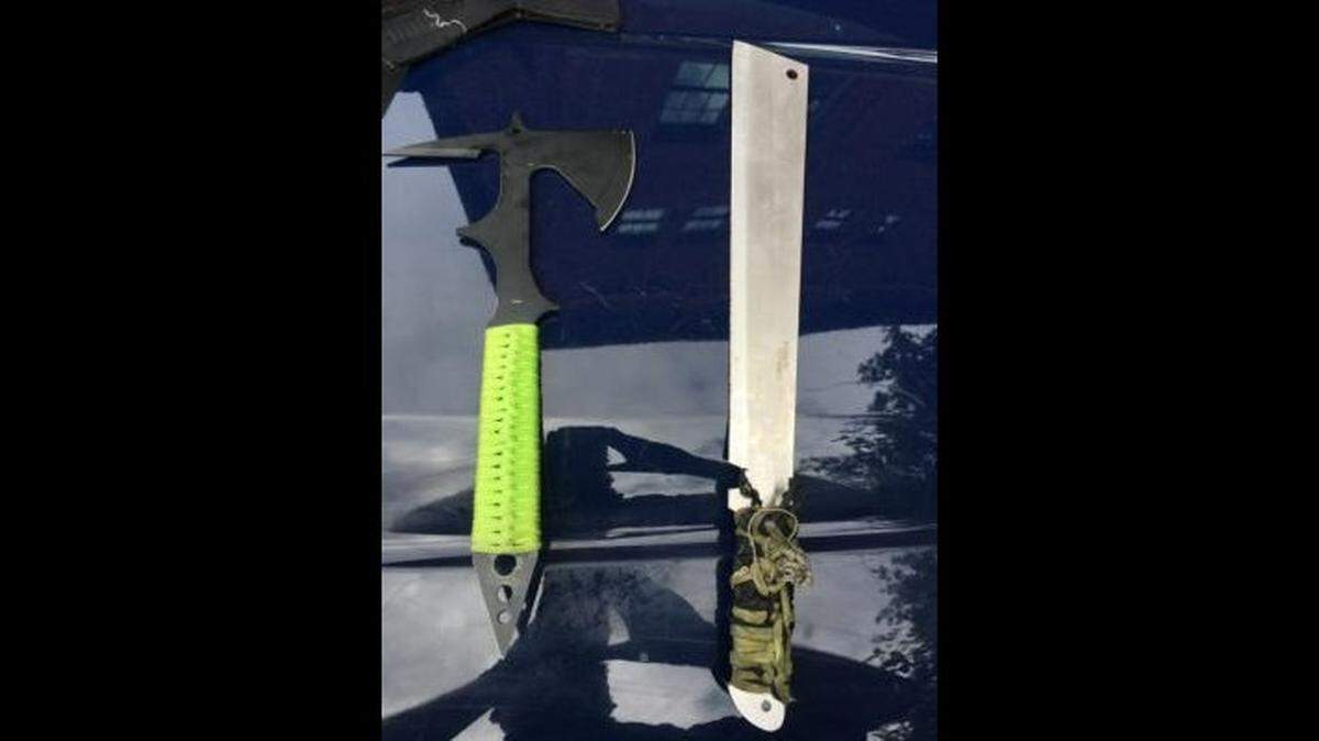Police found an ax and machete on 37-year-old Elizabeth A. Zurcher-Wood on Aug. 22, 2021, in Portland after they arrested her. Zurcher-Wood pulled out a machete when a family tried to get away from her after she accused them of stealing her son.