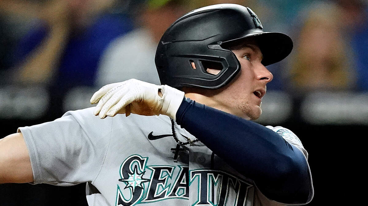 Seattle Mariners’ Jarred Kelenic watches his two-run home run during the fourth inning of a baseball game against the Kansas City Royals Friday, Sept. 17, 2021, in Kansas City, Mo. (AP Photo/Charlie Riedel)