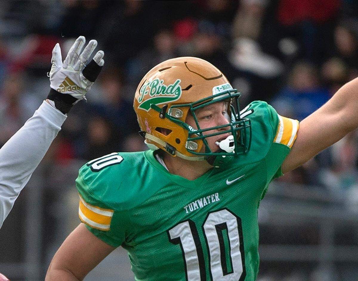 Tumwater defenders Max Henry (55) and Ryan Otton celebrate Gaven Murphy’s fumble recovery early in Saturday’s 2A state quarterfinal football game against Archbishop Murphy at Tumwater District Stadium on Nov. 23, 2019.