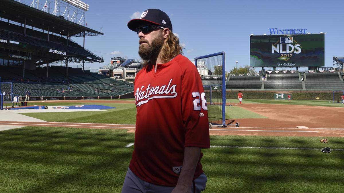Washington Nationals' Jayson Werth walks back to the dugout after a workout before Game 3 of the National League Division Series baseball game against the Chicago Cubs Monday, Oct. 9, 2017, in Chicago. (AP Photo/David Banks)