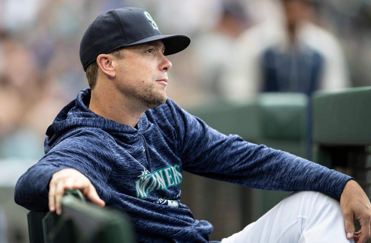 Seattle Mariners' Wade LeBlanc sits in the dugout before a baseball game against the Seattle Mariners, Thursday, July 5, 2018, in Seattle. The Mariners won the game 4-1. (AP Photo/Stephen Brashear)