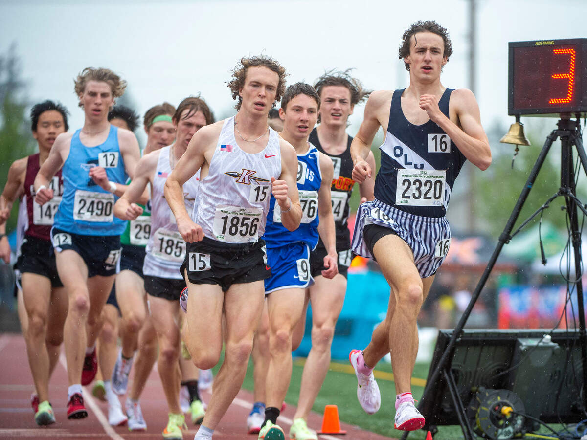 Olympia’s Ethan Coleman leads the pack after the second lap of the 1600-meters race at the State 2A, 3A, 4A track and field championships on Thursday, May 26, 2022, at Mount Tahoma High School in Tacoma Wash.
