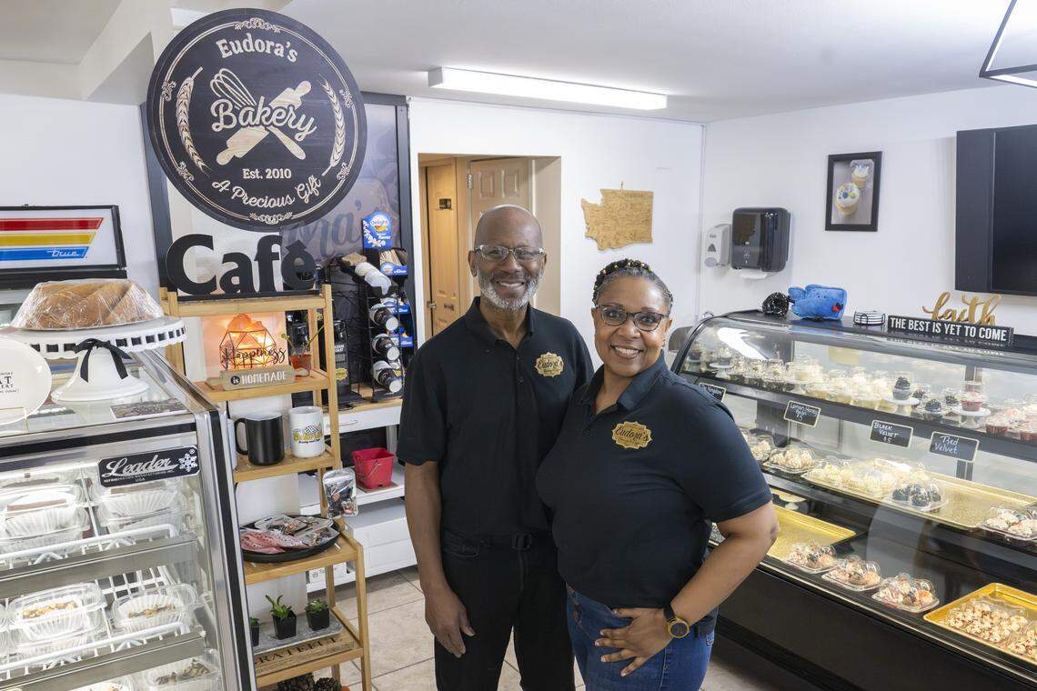 Von Gray, left, and Regina Eudora Gray stand in Eudora's Bakery & Cafe on Friday, Feb. 20, 2026, in Tacoma, Wash.
