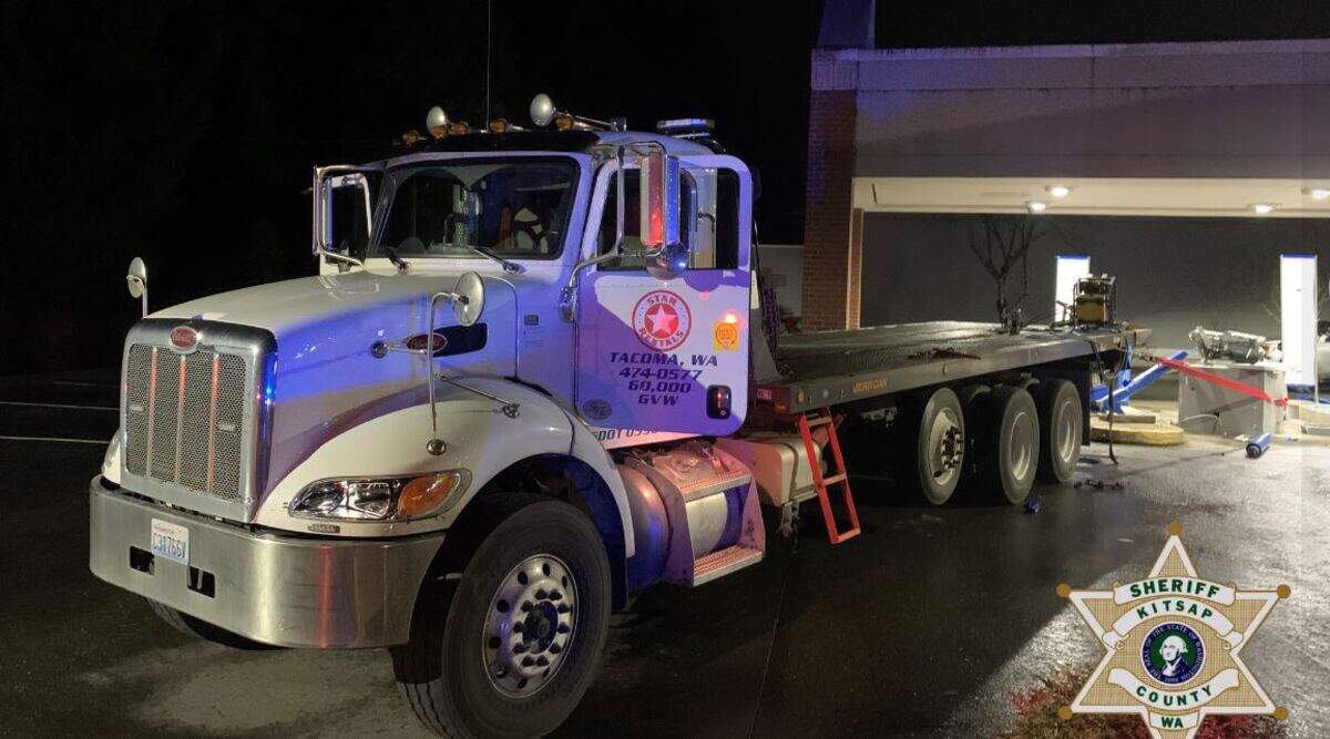 This semi tow truck stolen in Tacoma was used to pull an ATM from its spot outside a Kitsap County bank Monday.