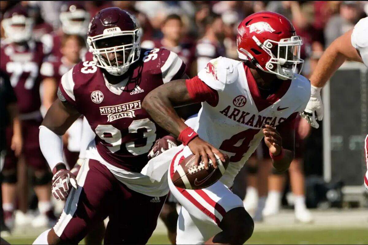 Mississippi State defensive tackle Cameron Young (93) pursues Arkansas quarterback Malik Hornsby (4) during the second half of an NCAA football game in Starkville, Mississippi, Saturday, Oct. 8, 2022. The Seahawks selected Young in the fourth round of the 2023 NFL draft.