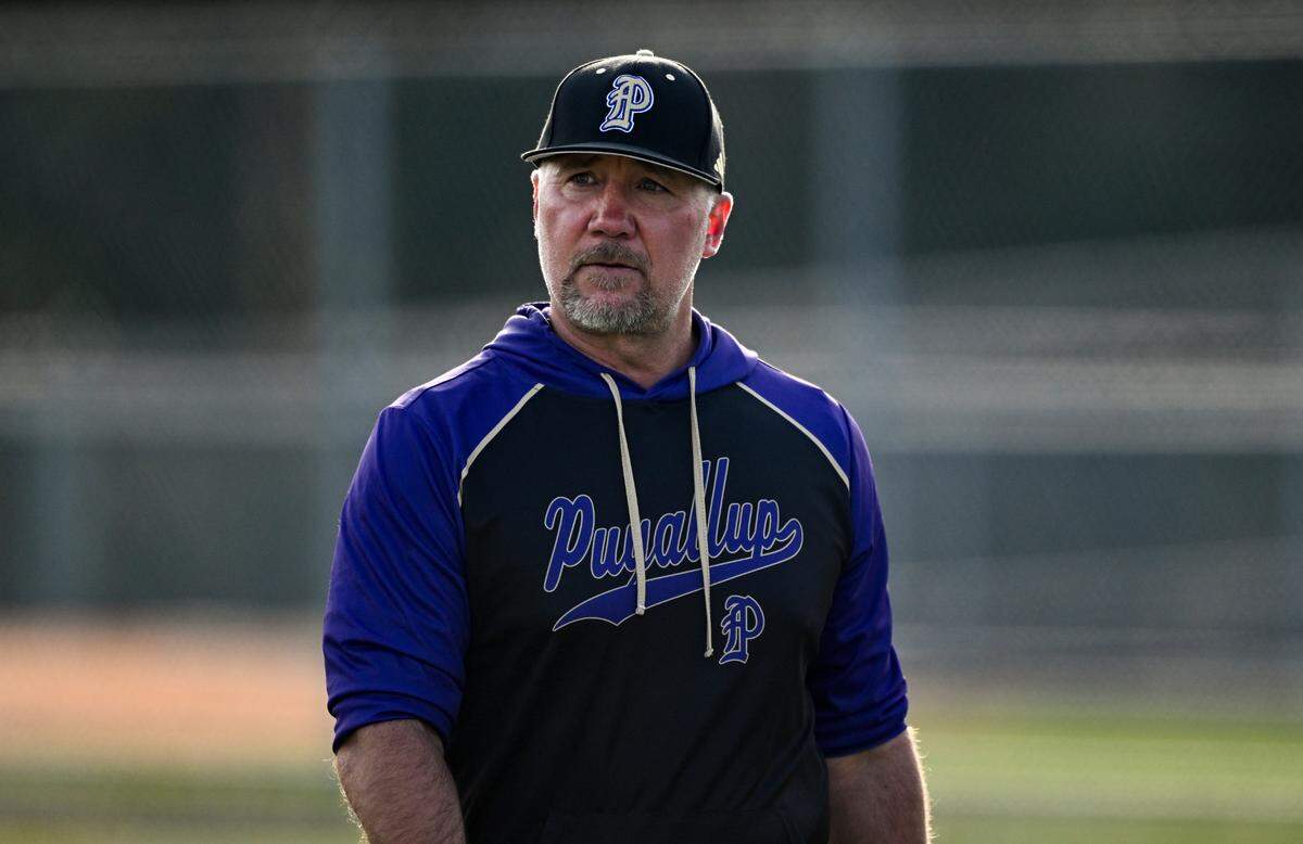 Puyallup head coach Marc Wiese walks off the field after a meeting at the mound during the baseball game at Curtis Senior High School, on Tuesday, April 15, 2025, in University Place, Wash.