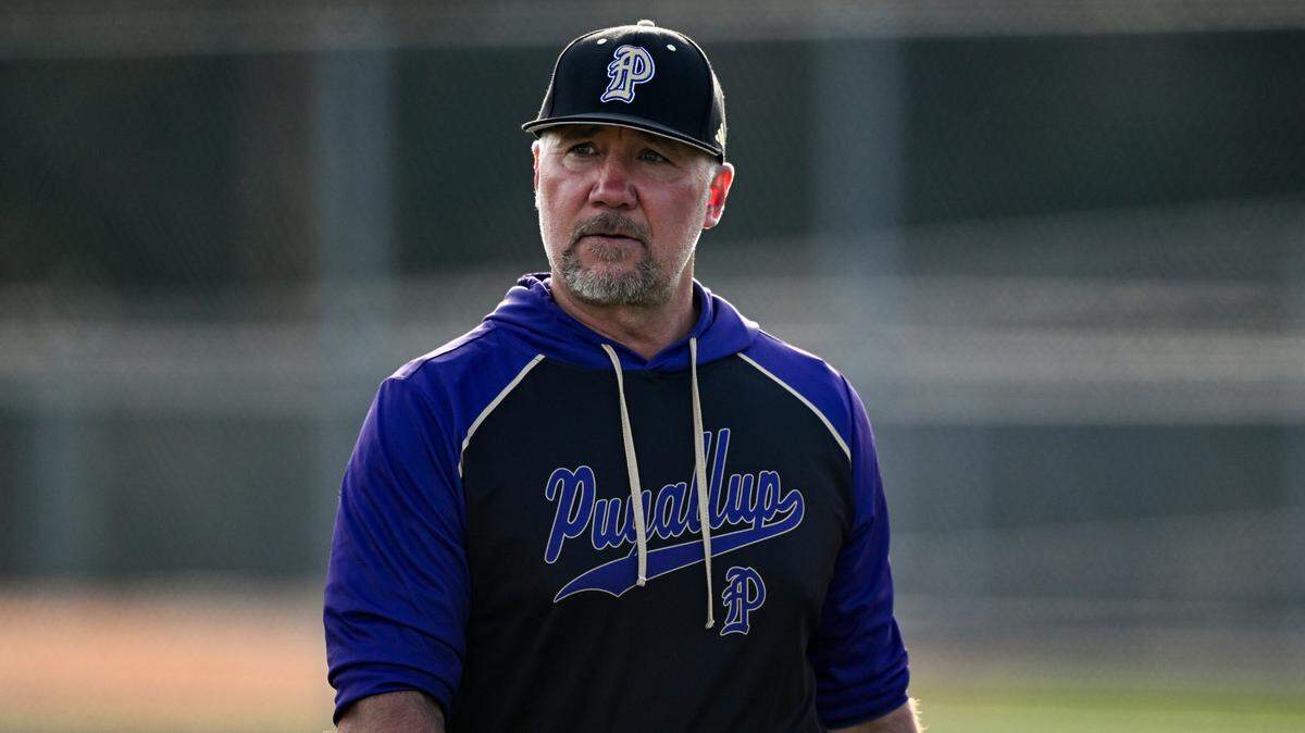 Puyallup head coach Marc Wiese walks off the field after a meeting at the mound during the baseball game at Curtis Senior High School, on Tuesday, April 15, 2025, in University Place, Wash.