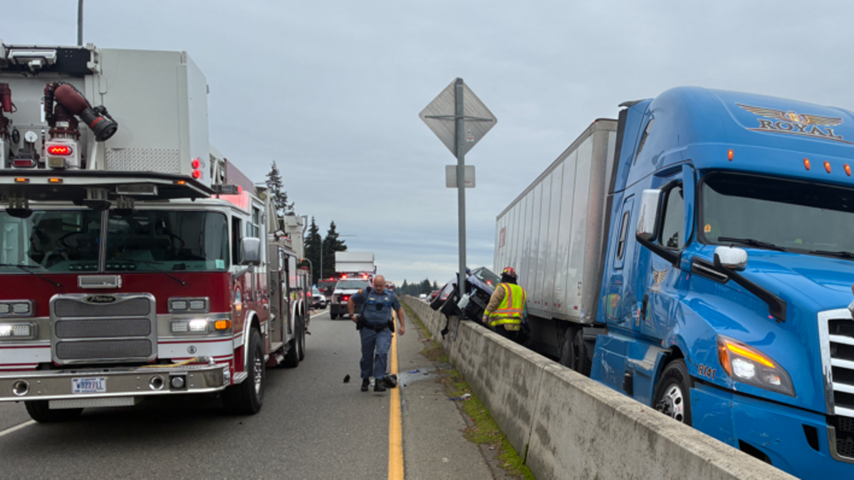 Traffic is backed up on Interstate 5 southbound after a crash involving a car and semi-truck on Dec. 3, 2025.
