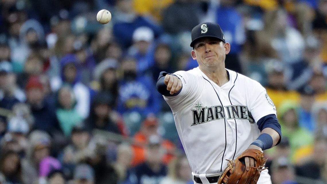 Seattle Mariners third baseman Ryon Healy in action against the Houston Astros in a baseball game Saturday, April 13, 2019, in Seattle. (AP Photo/Elaine Thompson)