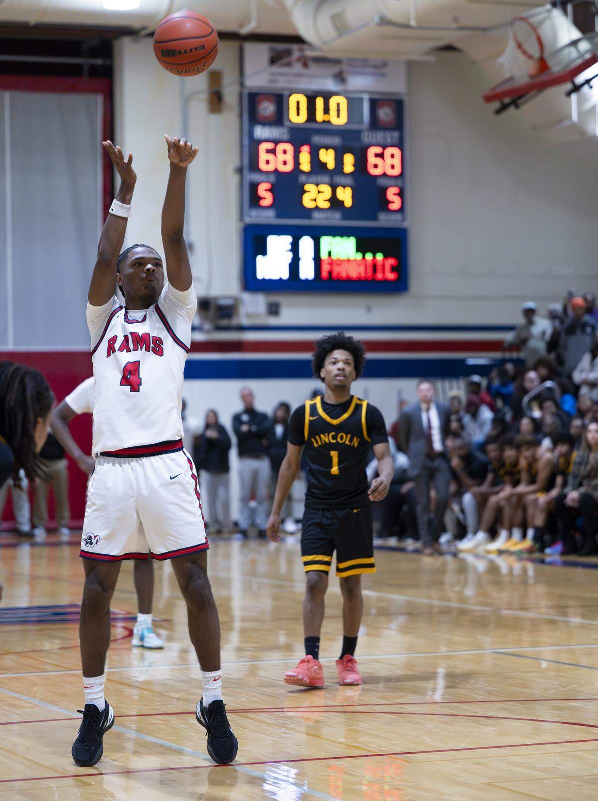 Silas guard MakHai Pleasant-Tolliver (4) sinks the free-throw to take the lead against Lincoln during the second half of the game at Silas High School, on Tuesday, Jan. 6, 2026 in Tacoma, Wash.