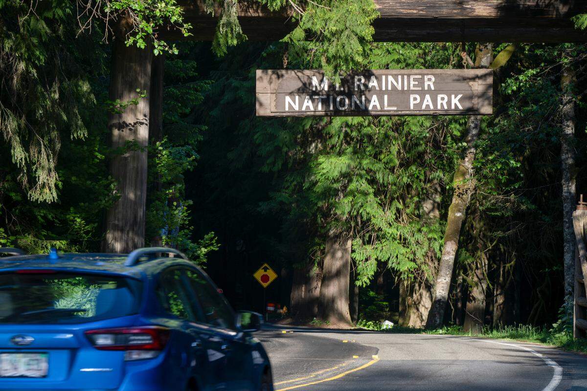 A car nears the Nisqually Entrance to Mount Rainier National Park on Friday, June 6, 2025.