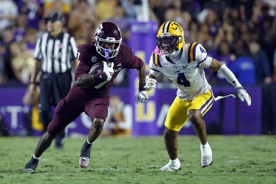 BATON ROUGE, LOUISIANA - OCTOBER 25: Wide receiver KC Concepcion #7 of the Texas A&M Aggies is defended by cornerback Mansoor Delane #4 of the LSU Tigers during the first half of a game at Tiger Stadium on October 25, 2025 in Baton Rouge, Louisiana. (Photo by Tyler Kaufman/Getty Images)