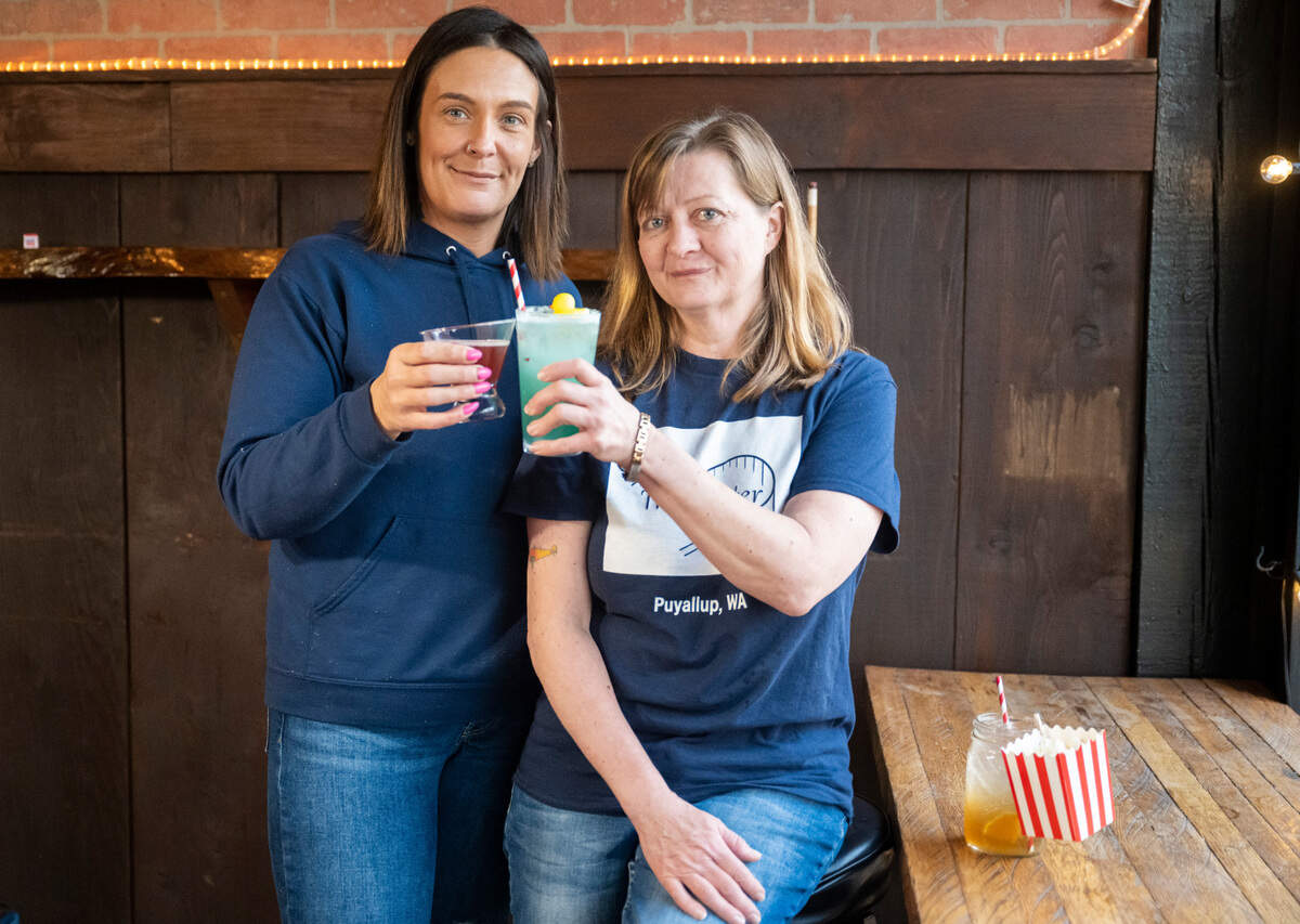 The Coaster co-owners Rachel Vincent, left, and Sandi Whitmore, right, at the front of the bar on 20, 2023. Both with decades of hospitality experience, they wanted to create a fun, laidback space that honored Puyallup.