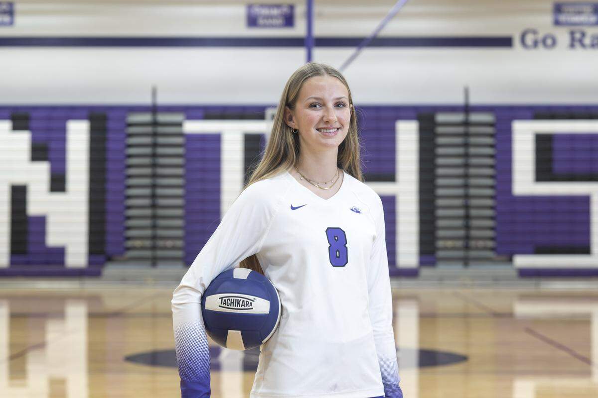 North Thurston's Addy Conner, named The News Tribune's All-Area volleyball player of the year, stands for a portrait on Monday, Dec. 15, 2025, at the school in Olympia, Wash. Conner guided the Rams to their first state title in program history.