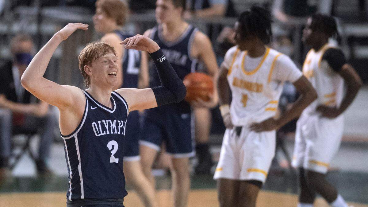 Olympia’s Andreas Engholm fires up the fans late in Wednesday afternoon’s opening-round game of the WIAA 4A Boys Basketball State Championships tournament in the Tacoma Dome in Tacoma, Washington, on Wednesday, March 2, 2022. Olympia defeated the Mariner Marauders, 50-41.
