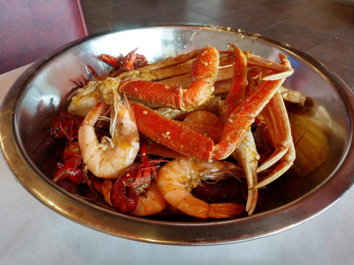 Crab, shrimp and crawfish served in a bowl at Boiling Crawfish in South Hill.
