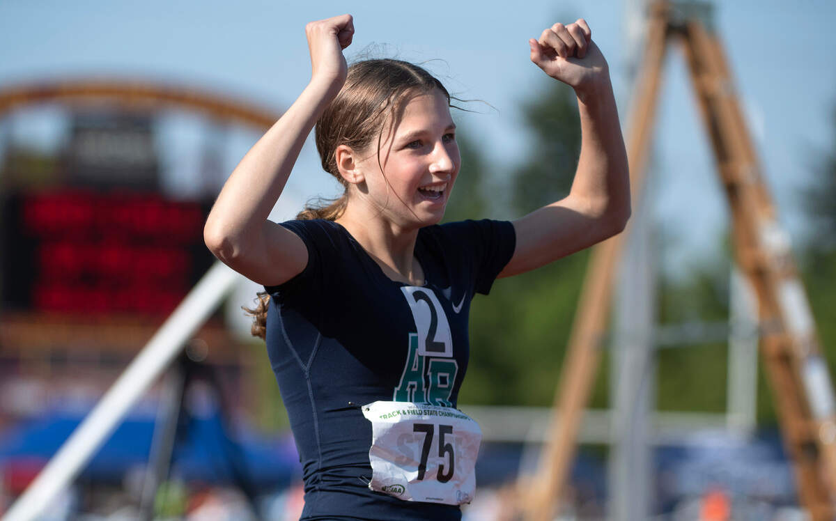Auburn Riverside’s Julia Couch celebrates following her come-from-behind state title in the 3A girls 1600-meter run during the opening day of the WIAA state track and field championships at Mount Tahoma High School in Tacoma, Washington, on Thursday, May 25, 2023.