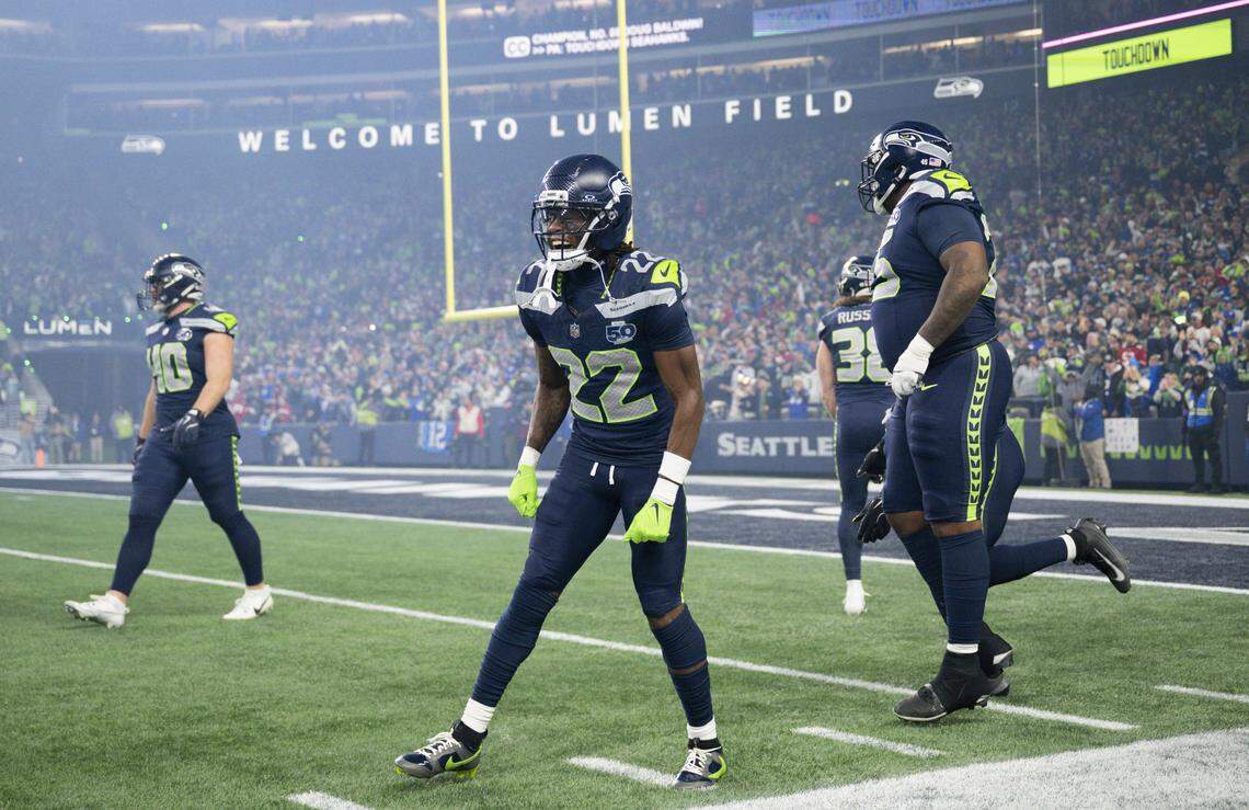 Seattle Seahawks wide receiver Rashid Shaheed (22) reacts to returning a 97-yard touchdown during the first quarter of the NFC Divisional Round game against the San Francisco 49ers at Lumen Field, on Saturday, Jan. 17, 2026, in Seattle.