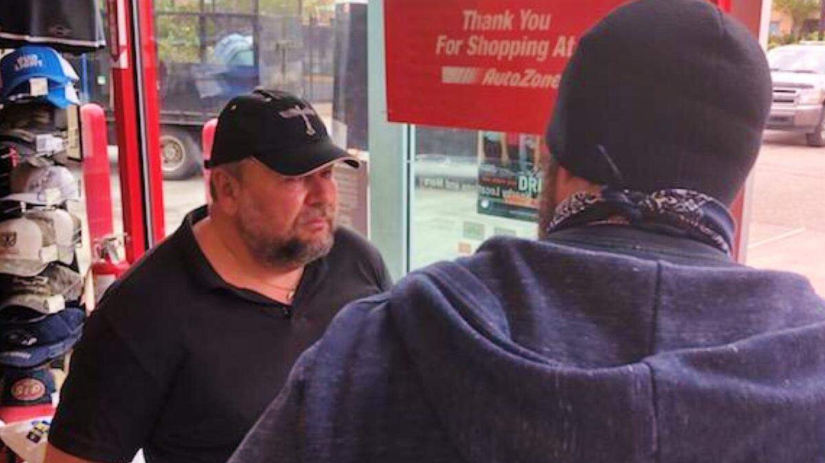 Jaromir Prokop, left, as he was arrested by Kitsap undercover deputies April 28 in an Auburn auto parts store.