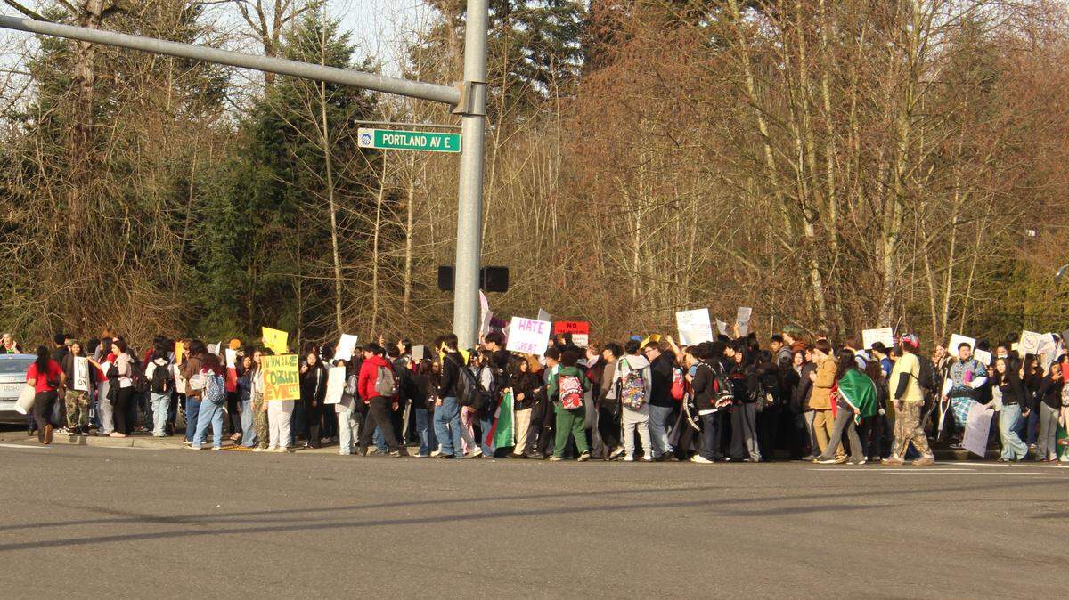 Franklin Pierce School District students and others protesting recent actions by U.S. Immigration and Customs Enforcement are seen near Franklin Pierce High School on Wednesday, Feb. 4, 2026.
