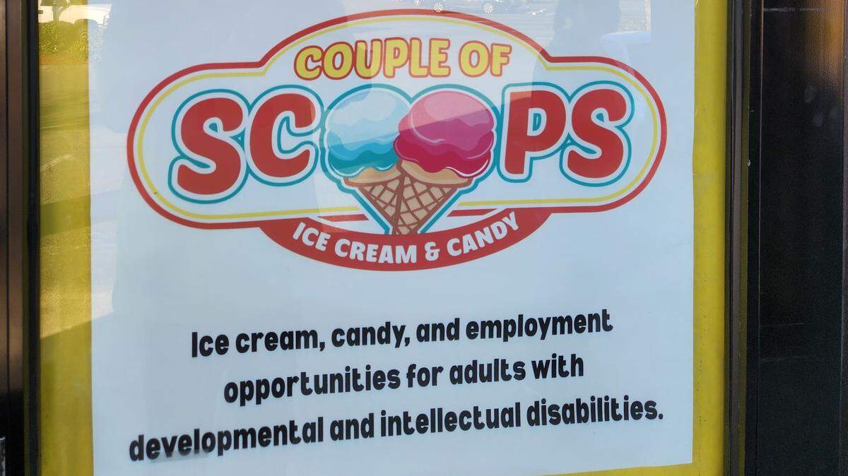 A ‘Coming Soon’ sign marks the exterior of the future Couple of Scoops location at 5500 Olympic Dr. NW, Suite H-103 in Gig Harbor, Wash. The store expects to open May 1, 2026.