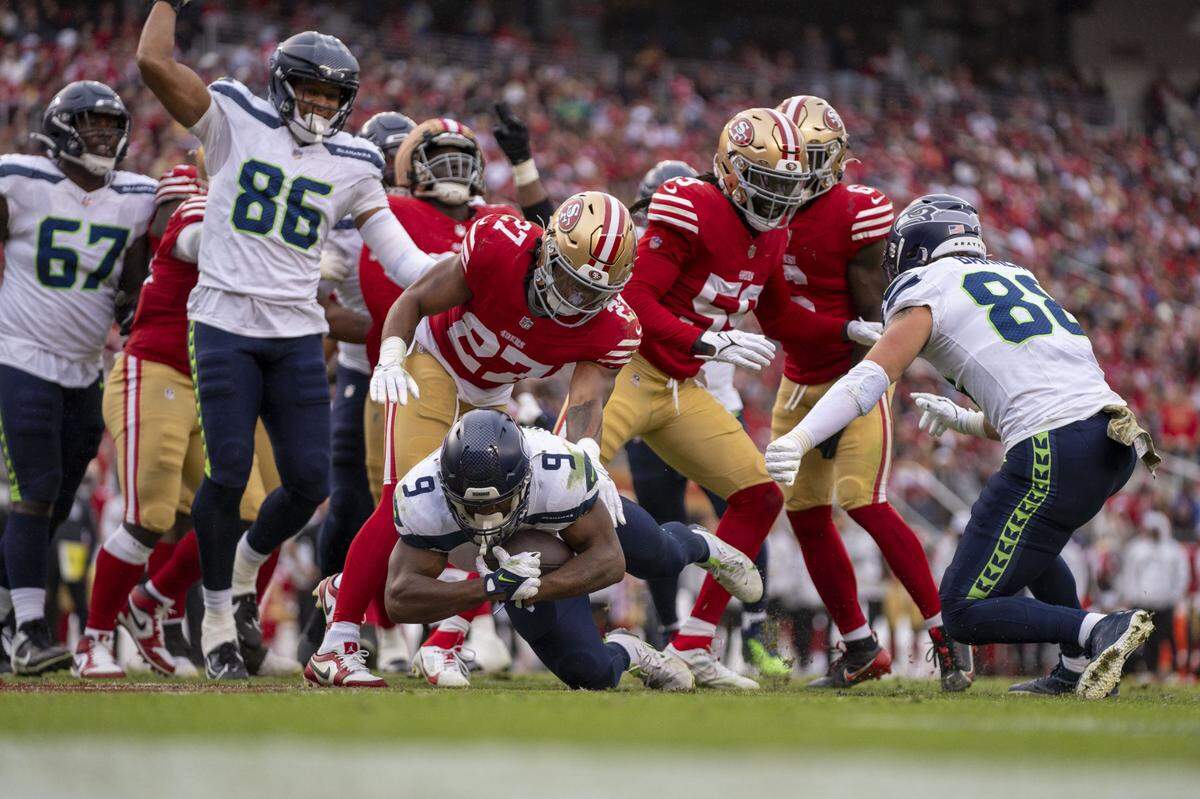 November 17, 2024; Santa Clara, California, USA; Seattle Seahawks running back Kenneth Walker III (9) scores a touchdown during the third quarter against the San Francisco 49ers at Levi's Stadium. Mandatory Credit: Kyle Terada-Imagn Images