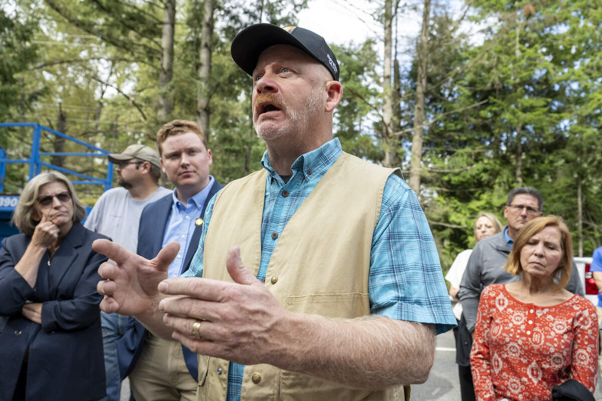 Buckley Mayor Beau Burkett asks about plans to prevent damages like this in the future to the White River Bridge during a visit to the bridge by Gov. Bob Ferguson on Monday, Sept. 8, 2025, in Enumclaw, Wash.
