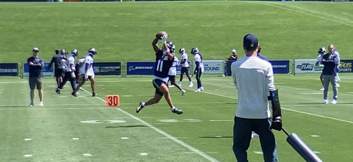 Rookie first-round pick Jaxon Smith-Njigba continued his impressive debut spring and summer for the Seahawks with catches like this and more on the second day of training camp, July 27, 2023, in Renton.