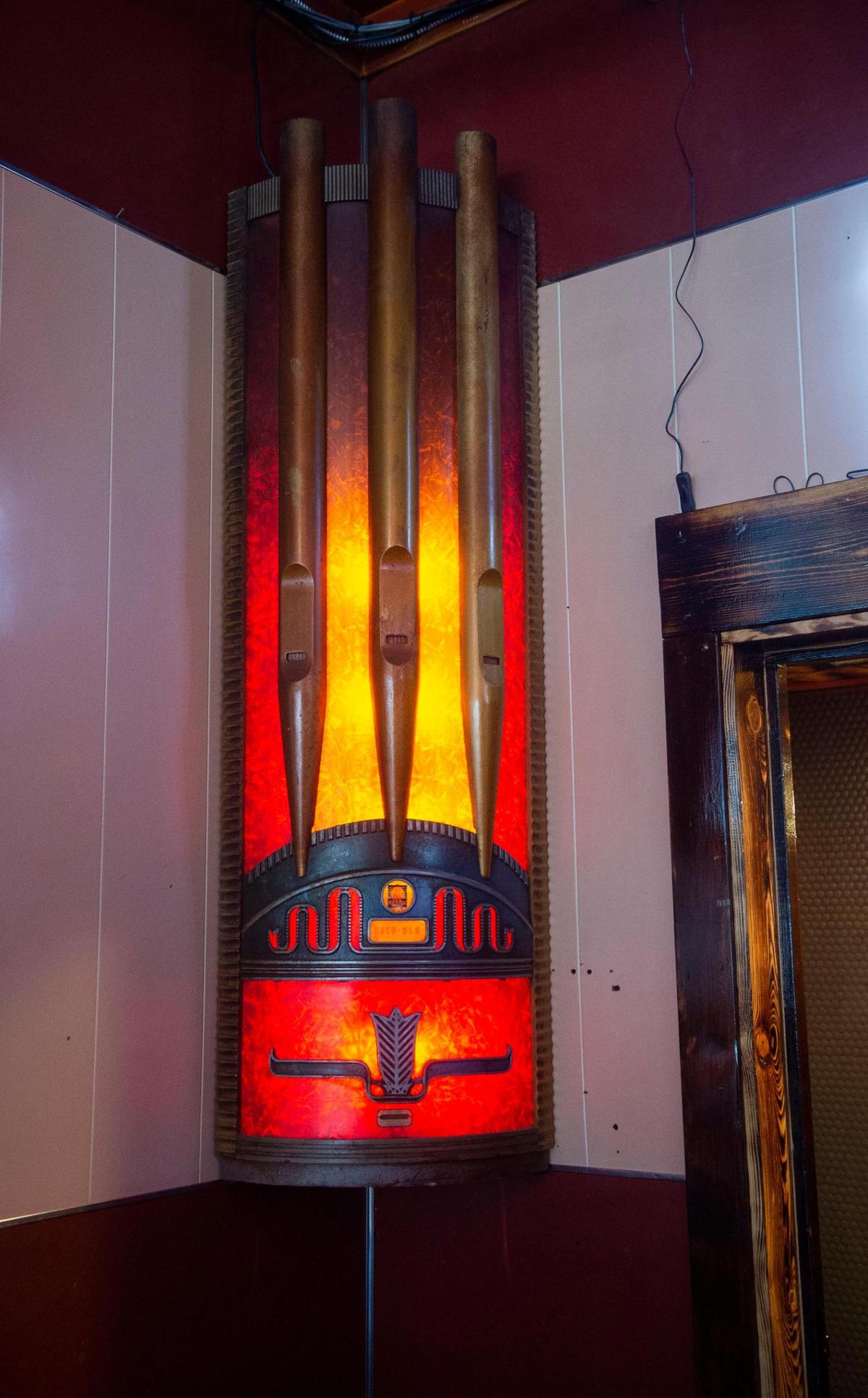 A vintage rockola jukebox speaker casts a spell of cool in a corner of Parky’s Pizza Bar in Tacoma on Wednesday, Sept. 1, 2021.
