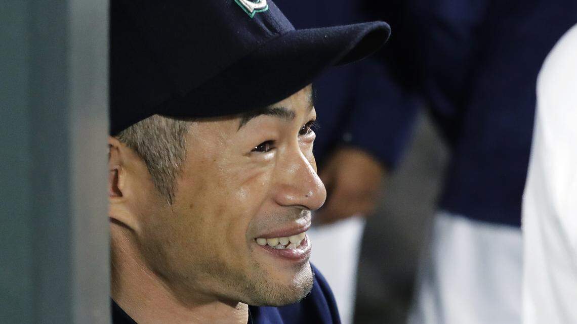 Seattle Mariners' Ichiro Suzuki stands in the dugout before a baseball game against the Houston Astros, Monday, April 16, 2018, in Seattle. (AP Photo/Ted S. Warren)