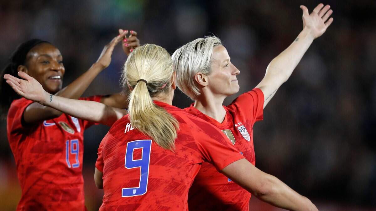U.S. forward Megan Rapinoe, right, celebrates her goal with midfielder Lindsey Horan, front, and defender Crystal Dunn during the second half of the team’s international friendly soccer match against Australia on Thursday, April 4, 2019, in Commerce City, Colo. The United States won 5-3. (AP Photo/David Zalubowski)