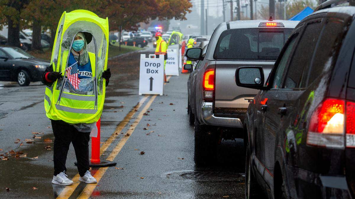 Election Center workers are shown in this 2020 file photo.