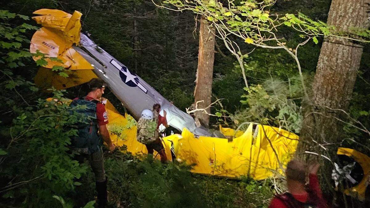 Rescuers at the site of a plane crash in Skamania County that killed the passenger and injured the pilot Friday, Sept. 6, 2024. Both men were from Eatonville.