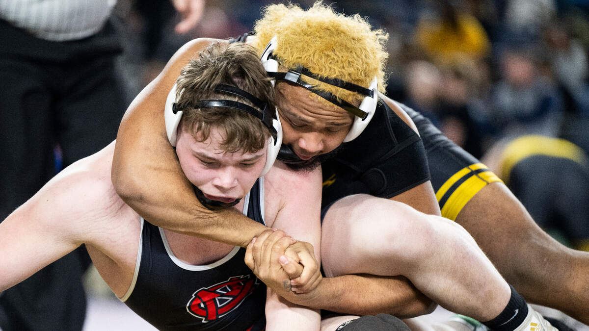 Lincoln’s Dre Tarrant Sio-Fetaui cradles North Central’s Jacob Sanchez during day 1 of the Mat Classic XXXVI at the Tacoma Dome, on Thursday, Feb. 20, 2025, in Tacoma, Wash.