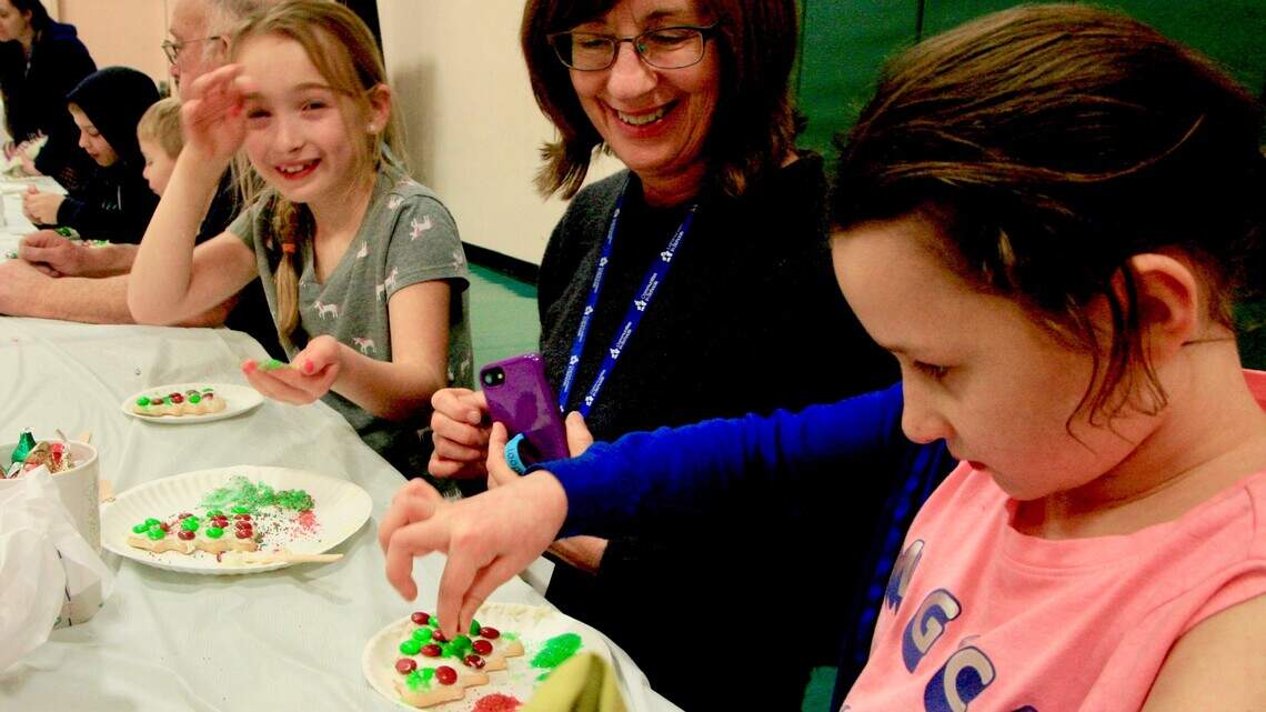 Readers and mentors turn the page on new year with fun and games