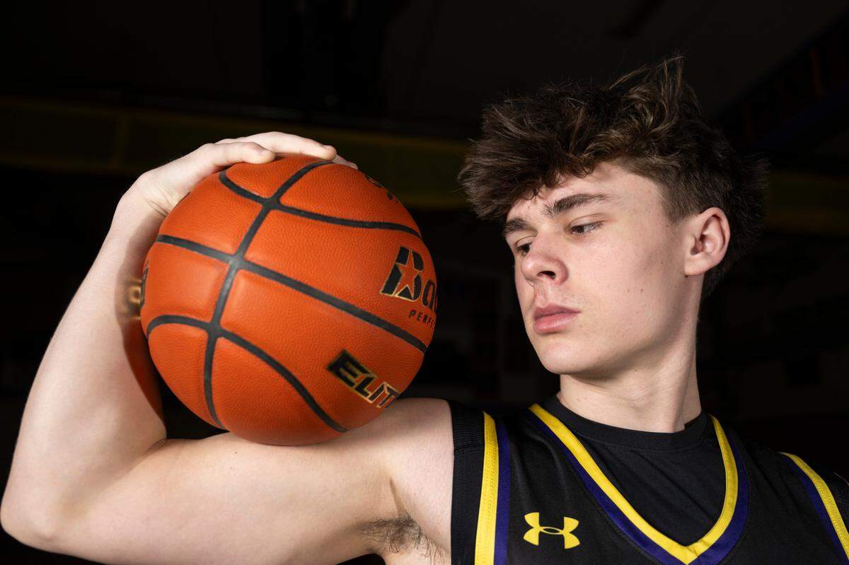 The News Tribune’s 2025 All-Area boys basketball first-team selection, Puyallup senior Drew Jones, poses for a portrait at Sumner High School, on Sunday, March 23, 2025, in Sumner.