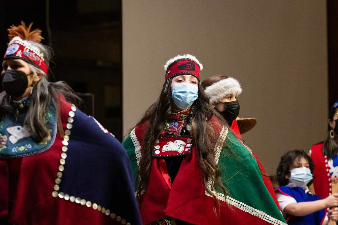 Sovereign Bill, center, who is also Tlingit and Muckleshoot, dances with the Alaska Kuteeyaa Dancers at the Elizabeth Peratrovich Day celebration Wednesday, Feb. 16, at the Evergreen Longhouse at Evergreen State College in Olympia, Wash. Bill is an actress and voice of Molly from the PBS children’s animated show “Molly of Denali,” the first U.S. children’s show about Alaska Natives.