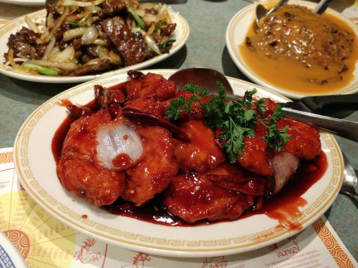 Genral Tso’s chicken (front) and Mongolian beef (back left) and egg foo young from House of Kee, a Chinese restaurant in South Hill.
