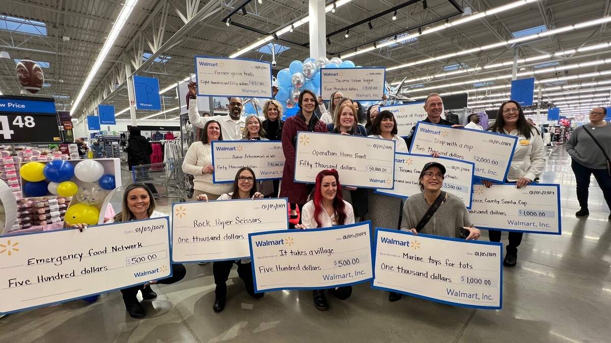 Representatives from area nonprofits received grants presented by the store and the Walmart Foundation during its Supercenter celebration Friday in Tacoma.