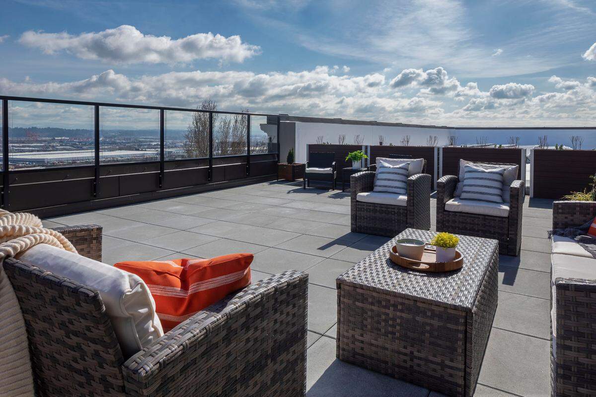 A rooftop communal space has views of downtown Tacoma and Mount Rainier at YWCA Pierce County’s Dorothy Height Apartments. The building recently opened, offering 54 affordable housing units to homeless and low-income individuals and families.