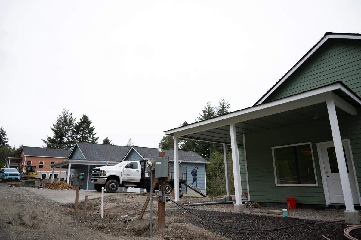 Habitat for Humanity works on three homes, only one of which has a family waiting to live in it, on Monday, April 8, 2024, in Gig Harbor, Wash.