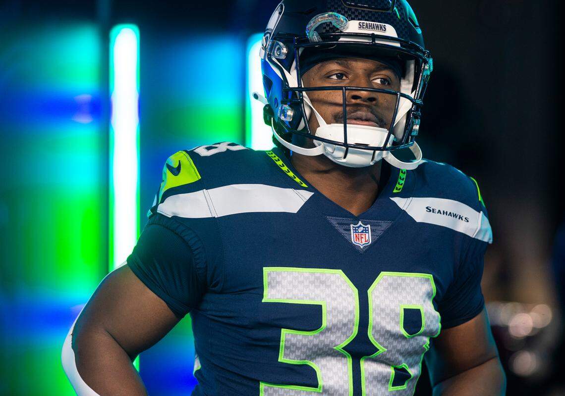 Seattle Seahawks running back Godwin Igwebuike (38) runs out of the tunnel before the start of an NFL game against the California Panthers at Lumen Field in Seattle Wash., on Dec. 11, 2022.